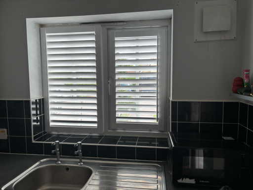 Kitchen Perfect Fit Shutters Telford Waterproof perfect fit plantation shutters in contemporary Telford kitchen window | Easy-clean solutions West Midlands