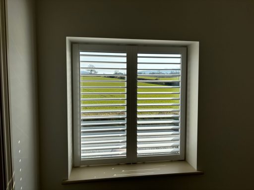 Kitchen Perfect Fit Shutters Wolverhampton Easy-clean perfect fit faux wood shutters in Wolverhampton kitchen window | Shutters Emporium