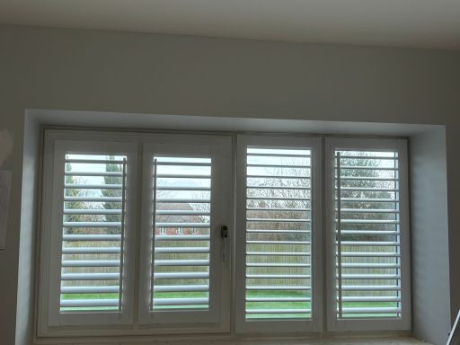 Living Room Perfect Fit Shutters Newport Neutral perfect fit shutters enhancing Newport living room interior | Shutters Emporium West Midlands